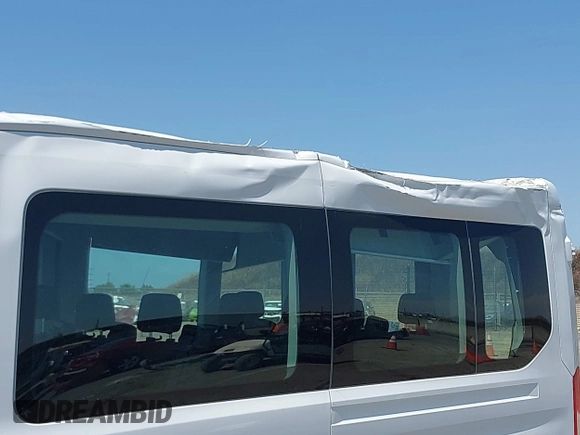 2023 Ford Transit Passenger XL with VIN 1FBAX2CG7PKC04821, listed as a IAAI auction lot 42379783 with 15,909 mi miles and . Bid and sale history available at DreamBid. Image 6.