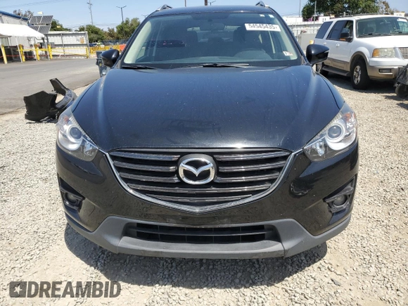 2016 Mazda CX-5 Touring with VIN JM3KE4CY2G0867484, listed as a Copart auction lot 54545435 with 100,664 mi miles and Salvage Title. Bid and sale history available at carsss.com. Image 5.