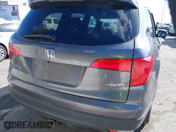 2017 Honda Pilot EX-L with VIN 5FNYF6H57HB021350, listed as a IAAI auction lot 41673635 with 101,980 mi miles and . Bid and sale history available at DreamBid. Image 16.