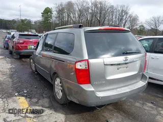 2010 Kia Sedona EX with VIN KNDMH4C33A6342127, listed as a IAAI auction lot 41570657 with 249,395 mi miles. Bid and sale history available at carsss.com. Image 3.