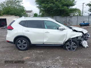 2017 Nissan Rogue SV with VIN 5N1AT2MVXHC844775, listed as a IAAI auction lot 42351482 with 87,195 mi miles and . Bid and sale history available at DreamBid. Image 13.
