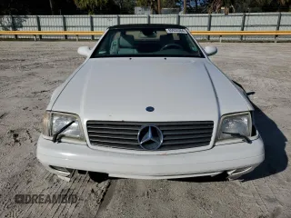 1999 Mercedes-Benz SL-Class with VIN WDBFA68F5XF184828, listed as a Copart auction lot 85935384 with 64,129 mi miles and Clean Title. Bid and sale history available at carsss.com. Image 5.