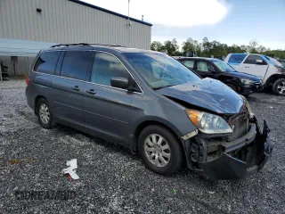 2010 Honda Odyssey EX-L with VIN 5FNRL3H73AB099787, listed as a Copart auction lot 52482325 with 235,785 mi miles and Salvage Title. Bid and sale history available at DreamBid. Image 4.