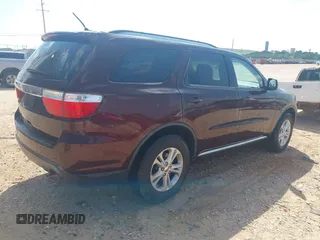 2012 Dodge Durango SXT with VIN 1C4RDHAG8CC361176, listed as a IAAI auction lot 42643631 with 201,419 mi miles and . Bid and sale history available at DreamBid. Image 4.