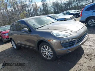 2012 Porsche Cayenne S z VIN WP1AB2A26CLA41874, wystawiony jako IAAI lot #41989485 z przebiegiem 119 869 mil mil oraz . Historia ofert i sprzedaży dostępna na DreamBid. Obrazek 1.