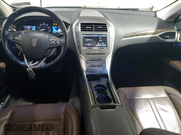 2015 Lincoln MKZ Hybrid with VIN 3LN6L2LU4FR607177, listed as a Copart auction lot 57472145 with 121,708 mi miles and Salvage title. Bid and sale history available at DreamBid. Image 8.