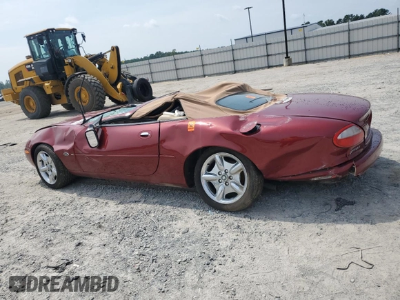 1999 Jaguar XK with VIN SAJGX204XXC038435, listed as a Copart auction lot 64843714 with Not Provided miles and Salvage Title. Bid and sale history available at DreamBid. Image 2.