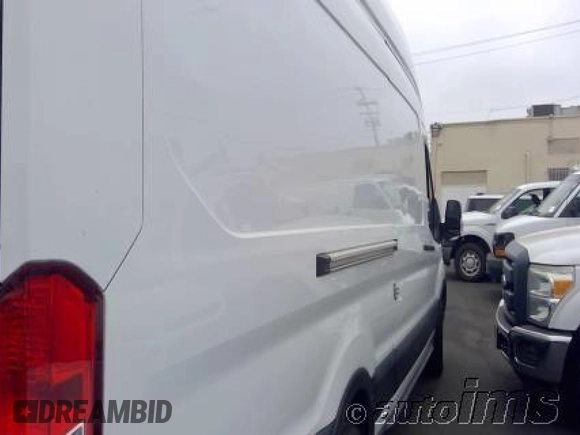 2020 Ford Transit Cargo z VIN 1FTBW3X87LKB80879, wystawiony jako IAAI lot #42546000 z przebiegiem 104 720 mil mil oraz . Historia ofert i sprzedaży dostępna na DreamBid. Obrazek 4.