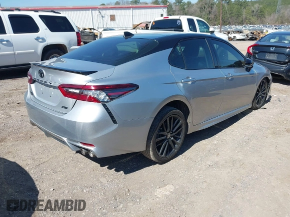 2022 Toyota Camry TRD with VIN 4T1KZ1AK8NU061810, listed as a IAAI auction lot 41769584 with 79,709 mi miles and . Bid and sale history available at DreamBid. Image 4.