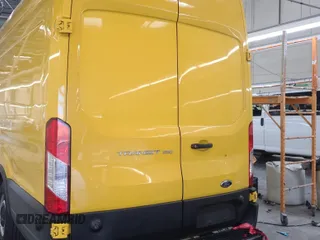 2019 Ford Transit z VIN 1FTYR3XM3KKA38669, wystawiony jako IAAI lot #42619599 z przebiegiem 135 929 mil mil oraz . Historia ofert i sprzedaży dostępna na DreamBid. Obrazek 28.