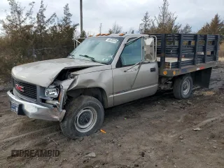 1999 GMC Sierra 1500 with VIN 1GDGC24R5XF054679, listed as a Copart auction lot 46752725 with 82,221 mi miles and Salvage Title. Bid and sale history available at DreamBid. Image 1.