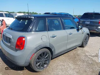 2015 MINI Hardtop 4 Door with VIN WMWXS5C55FT833925, listed as a IAAI auction lot 42505034 with 89,521 mi miles and . Bid and sale history available at DreamBid. Image 4.