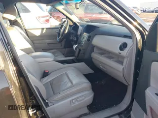 2009 Honda Pilot EX-L with VIN 5FNYF48659B012032, listed as a IAAI auction lot 41801232 with 205,636 mi miles and . Bid and sale history available at carsss.com. Image 5.