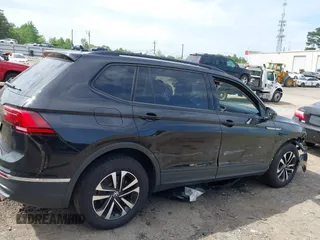 2023 Volkswagen Tiguan S with VIN 3VVRB7AX6PM108735, listed as a IAAI auction lot 42108217 with 13,279 mi miles and . Bid and sale history available at DreamBid. Image 13.