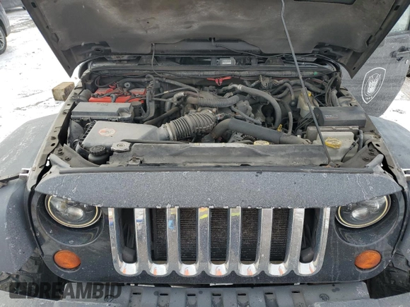 2011 Jeep Wrangler Rubicon with VIN 1J4BA6D1XBL556808, listed as a Copart auction lot 87358534 with 196,139 mi miles and Clean Title. Bid and sale history available at carsss.com. Image 11.