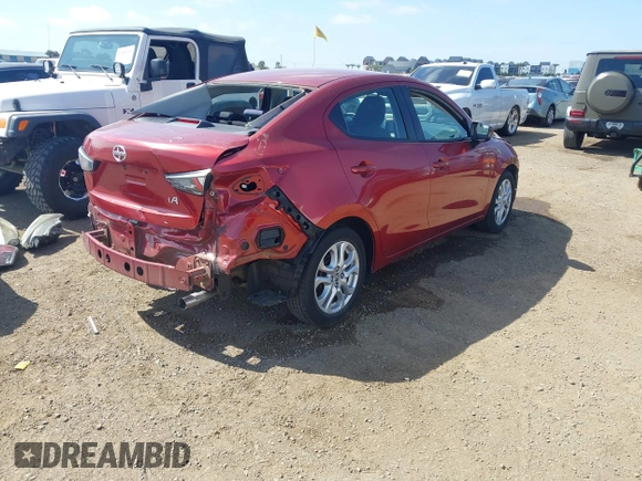 2016 Scion iA with VIN 3MYDLBZV8GY100223, listed as a IAAI auction lot 42078434 with 43,989 mi miles. Bid and sale history available at carsss.com. Image 4.