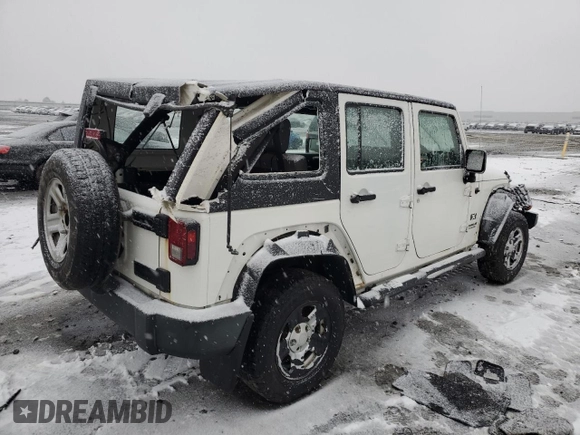 2009 Jeep Wrangler Unlimited X with VIN 1J4GZ39169L717946, listed as a Copart auction lot 87325954 with 0 mi miles and Salvage Title. Bid and sale history available at carsss.com. Image 3.