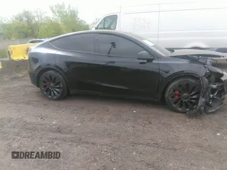 2022 Tesla Model Y Performance with VIN 7SAYGDEF6NF530388, listed as a IAAI auction lot 39253462 with 21,393 mi miles and . Bid and sale history available at DreamBid. Image 12.