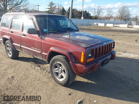 2000 Jeep Cherokee Classic with VIN 1J4FF58S7YL122676, listed as a IAAI auction lot 41710310 with 124,758 mi miles. Bid and sale history available at carsss.com. Image 1.
