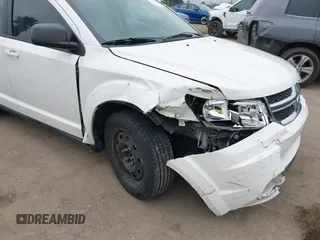 2014 Dodge Journey American Value with VIN 3C4PDCAB8ET141803, listed as a IAAI auction lot 42097292 with 76,339 mi miles and . Bid and sale history available at DreamBid. Image 6.