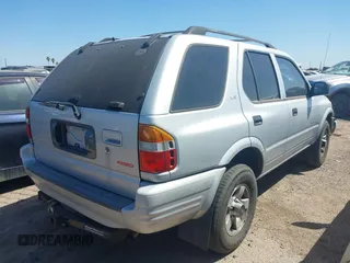 1999 Isuzu Rodeo S with VIN 4S2CM58W9X4354789, listed as a IAAI auction lot 42444956 with Not provided miles and . Bid and sale history available at DreamBid. Image 4.