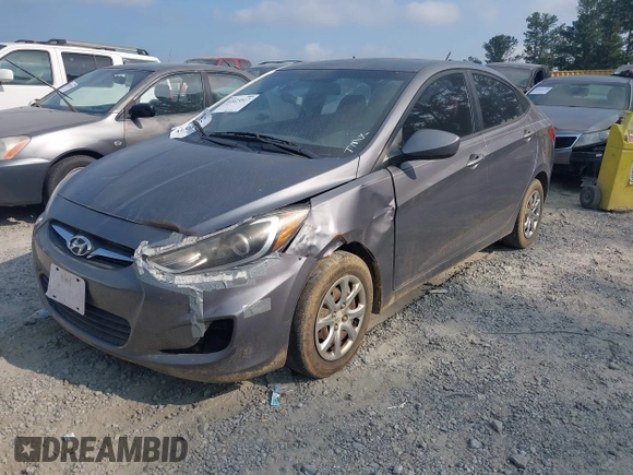2013 Hyundai Accent GLS z VIN KMHCT4AEXDU502319, wystawiony jako IAAI lot #42423517 z przebiegiem 228 402 mil mil oraz . Historia ofert i sprzedaży dostępna na DreamBid. Obrazek 2.
