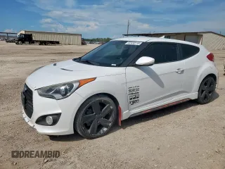 2013 Hyundai Veloster Turbo with VIN KMHTC6AE0DU169818, listed as a Copart auction lot 62430115 with 129,053 mi miles and Clean title. Bid and sale history available at DreamBid. Image 1.