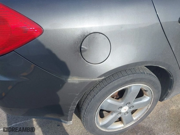 2005 Pontiac G6 GT with VIN 1G2ZH528954147048, listed as a IAAI auction lot 41202223 with 206,106 mi miles. Bid and sale history available at carsss.com. Image 6.