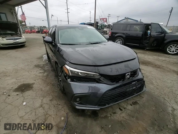 2023 Honda Civic EX z VIN 2HGFE1F72PH312995, wystawiony jako Copart lot #57284305 z przebiegiem 7 921 mil mil oraz Szkoda całkowita • Salvage title. Historia ofert i sprzedaży dostępna na DreamBid. Obrazek 13.