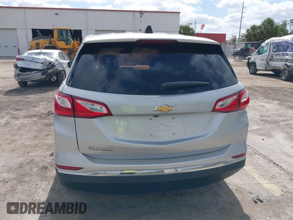 2018 Chevrolet Equinox LS with VIN 2GNAXHEV1J6110087, listed as a IAAI auction lot 42175959 with 124,611 mi miles and . Bid and sale history available at DreamBid. Image 16.