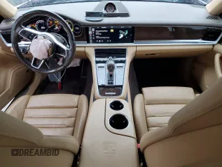 2018 Porsche Panamera 4 E-Hybrid с VIN WP0AE2A76JL128093, выставлен на аукционе Copart как лот 61402255 с пробегом 85 980 миль миль и Списание • Salvage title. История ставок и продаж доступна на DreamBid. Изображение 8.