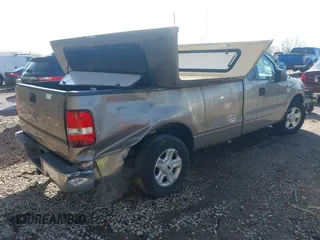 2004 Ford F-150 XL with VIN 1FTRF12W94NA93705, listed as a IAAI auction lot 41965446 with 209,097 mi miles. Bid and sale history available at carsss.com. Image 4.