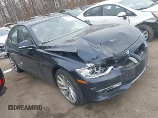 2013 BMW 3 Series 335i xDrive with VIN WBA3B9C50DJ899068, listed as a IAAI auction lot 41331622 with 156,216 mi miles. Bid and sale history available at carsss.com. Image 1.