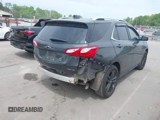 2021 Chevrolet Equinox LT with VIN 3GNAXUEVXML341465, listed as a IAAI auction lot 42027654 with 126,932 mi miles and . Bid and sale history available at DreamBid. Image 4.