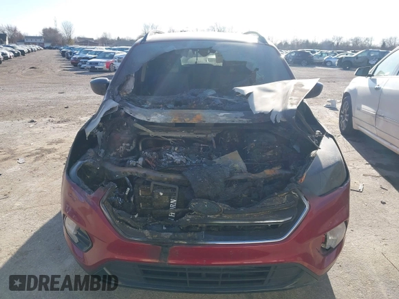 2019 Ford Escape SE z VIN 1FMCU9GDXKUA02974, wystawiony jako IAAI lot #41418960 z przebiegiem Nie podano mil oraz . Historia ofert i sprzedaży dostępna na DreamBid. Obrazek 6.
