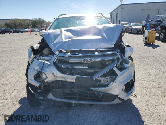 2017 Ford Escape SE with VIN 1FMCU9G90HUA39911, listed as a Copart auction lot 47670195 with 124,269 mi miles and Salvage Title. Bid and sale history available at carsss.com. Image 5.