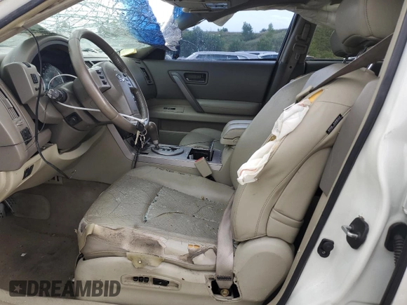 2004 Infiniti FX with VIN JNRAS08W94X203294, listed as a Copart auction lot 61272185 with 263,054 mi miles and Salvage title. Bid and sale history available at DreamBid. Image 7.