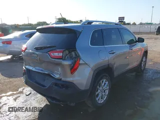 2016 Jeep Cherokee Latitude with VIN 1C4PJMCB5GW218166, listed as a IAAI auction lot 40458497 with 145,272 mi miles and . Bid and sale history available at carsss.com. Image 4.