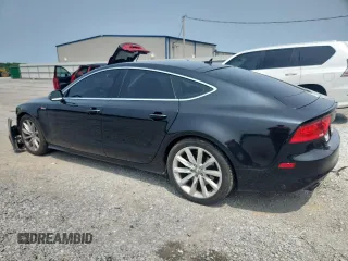 2012 Audi A7 Prestige with VIN WAU2GAFC1CN081915, listed as a Copart auction lot 59494105 with 169,556 mi miles and Salvage title. Bid and sale history available at DreamBid. Image 2.