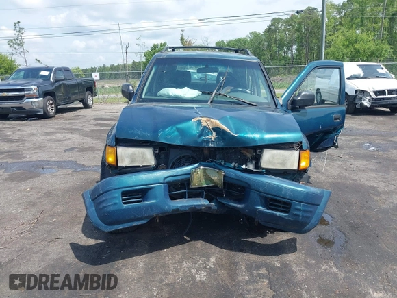 1999 Isuzu Rodeo S with VIN 4S2CK58W6X4332027, listed as a IAAI auction lot 42087396 with 258,508 mi miles and . Bid and sale history available at DreamBid. Image 11.