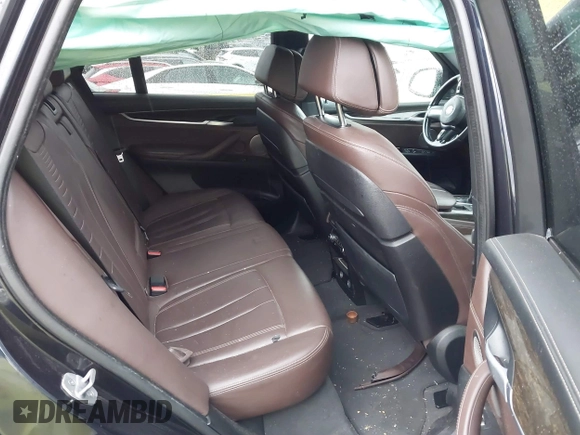 2015 BMW X5 xDrive35i z VIN 5UXKR0C59F0K65982, wystawiony jako IAAI lot #41827942 z przebiegiem 81 019 mil mil oraz . Historia ofert i sprzedaży dostępna na DreamBid. Obrazek 8.
