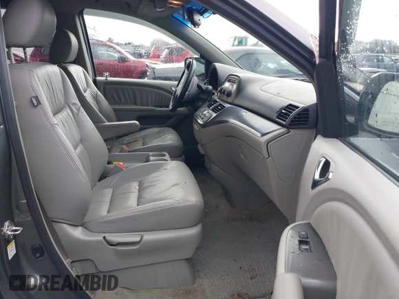 2007 Honda Odyssey EX-L z VIN 5FNRL386X7B445642, wystawiony jako IAAI lot #40652844 z przebiegiem 202 622 mil mil oraz . Historia ofert i sprzedaży dostępna na DreamBid. Obrazek 5.