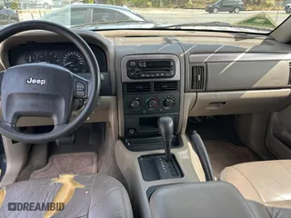 2004 Jeep Grand Cherokee Laredo with VIN 1J4GX48N24C436753, listed as a Copart auction lot 48782585 with 114,035 mi miles and Clean Title. Bid and sale history available at carsss.com. Image 9.