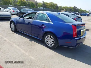 2012 Cadillac CTS Luxury with VIN 1G6DE5E59C0102621, listed as a IAAI auction lot 42554121 with 128,430 mi miles and . Bid and sale history available at DreamBid. Image 3.