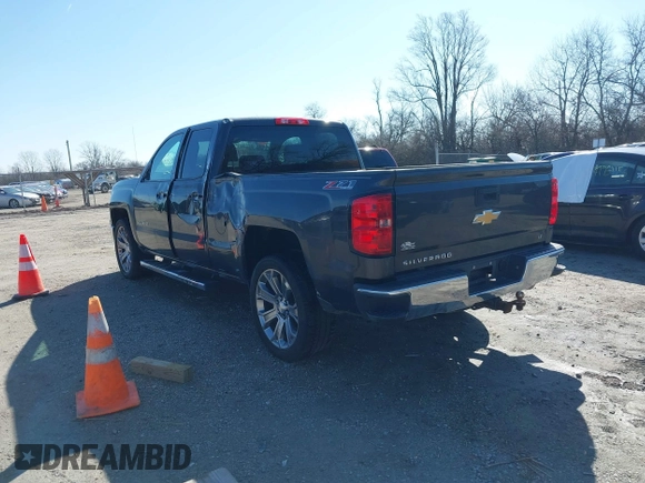 2014 Chevrolet Silverado 1500 LT with VIN 1GCVKREC0EZ377177, listed as a IAAI auction lot 41683600 with 148,672 mi miles and . Bid and sale history available at DreamBid. Image 3.