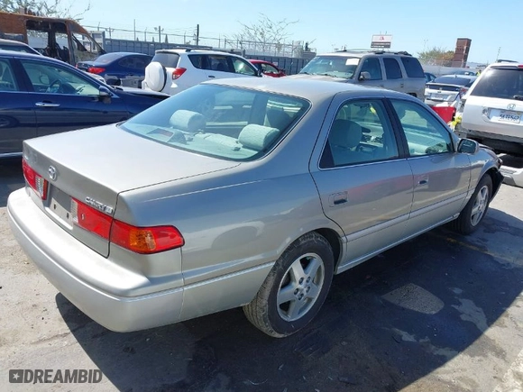 2001 Toyota Camry CE with VIN JT2BG22K210569246, listed as a IAAI auction lot 41807555 with 79,226 mi miles. Bid and sale history available at carsss.com. Image 4.