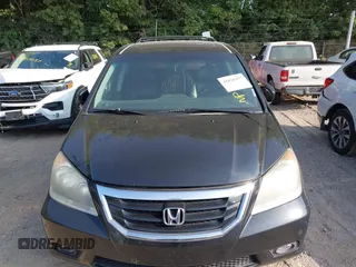 2010 Honda Odyssey Touring with VIN 5FNRL3H96AB031016, listed as a IAAI auction lot 42828397 with 261,881 mi miles and . Bid and sale history available at DreamBid. Image 6.
