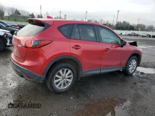2014 Mazda CX-5 Touring с VIN JM3KE2CY3E0308740, выставлен на аукционе Copart как лот 88127365 с пробегом 137 690 миль миль и Списание • Salvage title. История ставок и продаж доступна на DreamBid. Изображение 3.