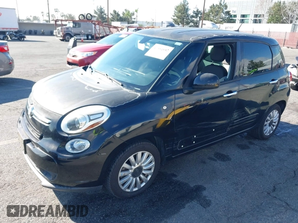 2014 FIAT 500L Easy with VIN ZFBCFABH6EZ001258, listed as a IAAI auction lot 41354892 with 67,852 mi miles and . Bid and sale history available at DreamBid. Image 2.