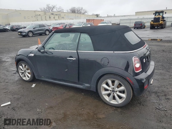 2015 MINI Convertible S with VIN WMWZP3C51FT708886, listed as a Copart auction lot 46860925 with 105,437 mi miles and Clean title. Bid and sale history available at DreamBid. Image 2.